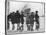 Group of Boys Lean Against the Dock Railings and Watch a Steamship Being Built-null-Stretched Canvas