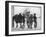 Group of Boys Lean Against the Dock Railings and Watch a Steamship Being Built-null-Framed Art Print