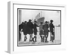 Group of Boys Lean Against the Dock Railings and Watch a Steamship Being Built-null-Framed Art Print