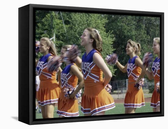 Group of Cheerleaders Cheering in a Field-null-Framed Stretched Canvas