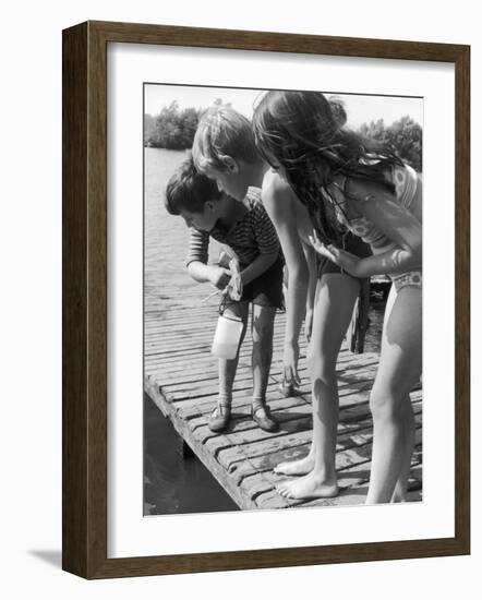 Group of Children Fishing from a Jetty-null-Framed Photographic Print