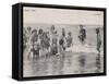 Group of Children in Striped Bathing Costumes Paddle Happily in the Surf at Heyst Sur Mer Belgium-null-Framed Stretched Canvas