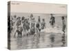 Group of Children in Striped Bathing Costumes Paddle Happily in the Surf at Heyst Sur Mer Belgium-null-Stretched Canvas