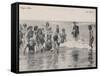 Group of Children in Striped Bathing Costumes Paddle Happily in the Surf at Heyst Sur Mer Belgium-null-Framed Stretched Canvas