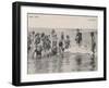 Group of Children in Striped Bathing Costumes Paddle Happily in the Surf at Heyst Sur Mer Belgium-null-Framed Photographic Print