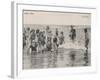 Group of Children in Striped Bathing Costumes Paddle Happily in the Surf at Heyst Sur Mer Belgium-null-Framed Photographic Print