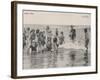 Group of Children in Striped Bathing Costumes Paddle Happily in the Surf at Heyst Sur Mer Belgium-null-Framed Photographic Print