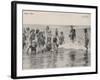 Group of Children in Striped Bathing Costumes Paddle Happily in the Surf at Heyst Sur Mer Belgium-null-Framed Photographic Print