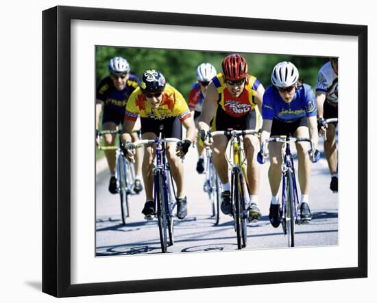 Group of Cyclists Riding Bicycles-null-Framed Photographic Print