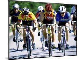 Group of Cyclists Riding Bicycles-null-Mounted Photographic Print