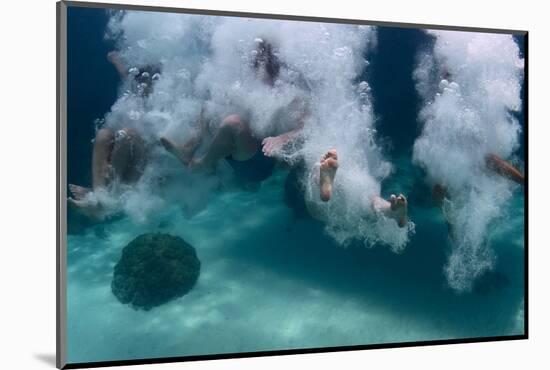 Group of Friends Having Fun by Jumping into Sea-Dudarev Mikhail-Mounted Photographic Print