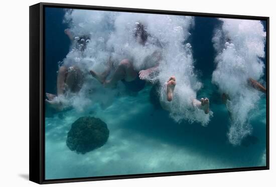 Group of Friends Having Fun by Jumping into Sea-Dudarev Mikhail-Framed Stretched Canvas