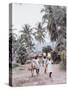 Group of Haitian Woman and a Donkey Walking Down a Dirt Road-Lynn Pelham-Stretched Canvas