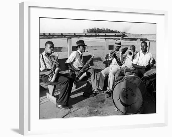 Group of Musicians Playing Along Side the Mississippi River-null-Framed Photographic Print