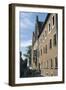 Group of People in Front of a Building-null-Framed Photographic Print