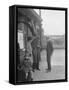 Group of people outside a Metropolitan Line railway station, London, 1930s-Bill Brunell-Framed Stretched Canvas