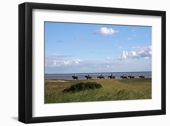 Group of riders in the Braderup Heath, Wenningstedt, Sylt, Schleswig Holstein, Germany-null-Framed Art Print
