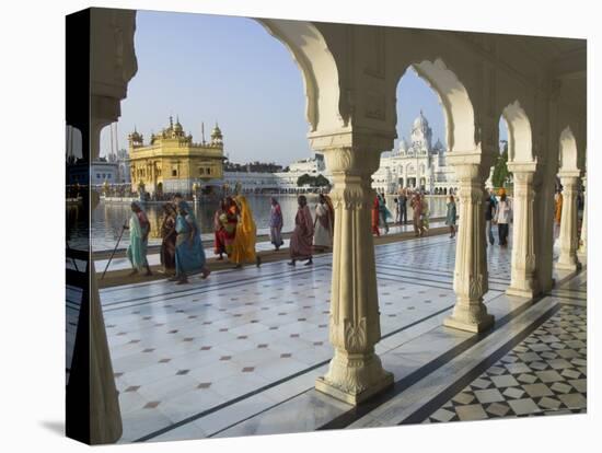 Group of Sikh Women Pilgrims Walking Around Holy Pool, Golden Temple, Amritsar, Punjab State, India-Eitan Simanor-Stretched Canvas