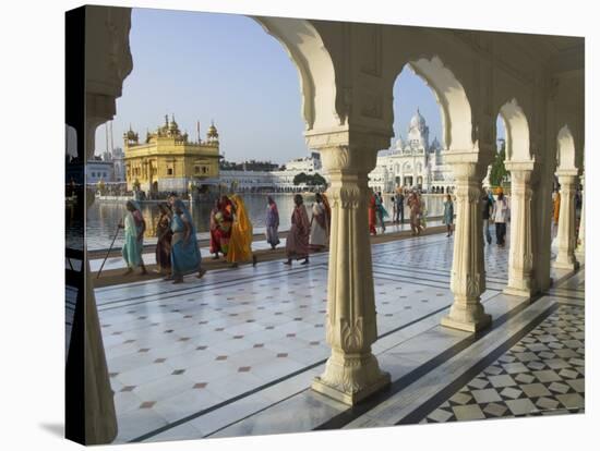 Group of Sikh Women Pilgrims Walking Around Holy Pool, Golden Temple, Amritsar, Punjab State, India-Eitan Simanor-Stretched Canvas