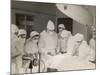 Group of Student Nurses in Theatre Observing a Surgeon Performing an Operation-null-Mounted Photographic Print