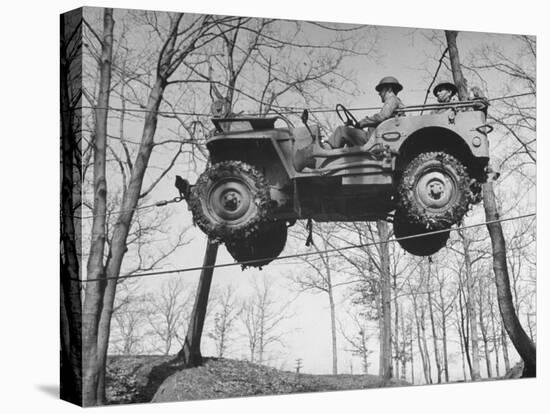 Group of Us Soldiers Pulling a Jeep over a Ravine Using Ropes while on Maneuvers-William C^ Shrout-Stretched Canvas