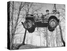 Group of Us Soldiers Pulling a Jeep over a Ravine Using Ropes while on Maneuvers-William C^ Shrout-Stretched Canvas