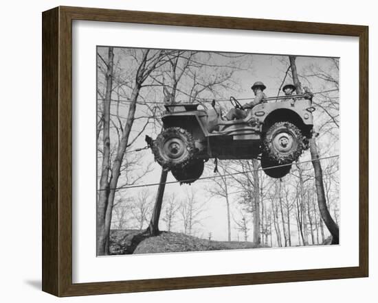 Group of Us Soldiers Pulling a Jeep over a Ravine Using Ropes while on Maneuvers-William C^ Shrout-Framed Photographic Print