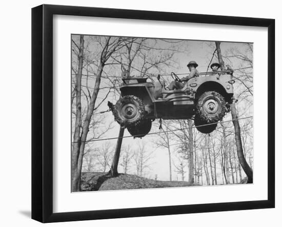 Group of Us Soldiers Pulling a Jeep over a Ravine Using Ropes while on Maneuvers-William C^ Shrout-Framed Photographic Print