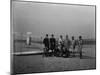 Group portrait in front of glider at Kill Devil Hill Photograph - Kitty Hawk, NC-Lantern Press-Mounted Art Print