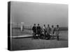 Group portrait in front of glider at Kill Devil Hill Photograph - Kitty Hawk, NC-Lantern Press-Stretched Canvas