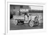 Grove Lime and Coal Company in Front of a Building Sign That Reads Gasoline-null-Framed Art Print