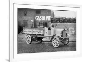 Grove Lime and Coal Company in Front of a Building Sign That Reads Gasoline-null-Framed Art Print