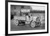 Grove Lime and Coal Company in Front of a Building Sign That Reads Gasoline-null-Framed Art Print