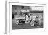 Grove Lime and Coal Company in Front of a Building Sign That Reads Gasoline-null-Framed Art Print