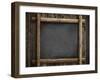 Grunge Blackboard Hanging on Wooden Wall as a Background-Andrey_Kuzmin-Framed Photographic Print