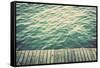 Grunge Wood Boards of a Pier over Ocean with Rippling Waves. Vintage Background-Michal Bednarek-Framed Stretched Canvas