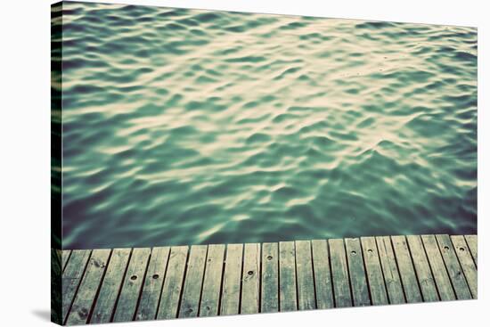 Grunge Wood Boards of a Pier over Ocean with Rippling Waves. Vintage Background-Michal Bednarek-Stretched Canvas