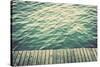 Grunge Wood Boards of a Pier over Ocean with Rippling Waves. Vintage Background-Michal Bednarek-Stretched Canvas