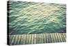 Grunge Wood Boards of a Pier over Ocean with Rippling Waves. Vintage Background-Michal Bednarek-Stretched Canvas