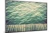 Grunge Wood Boards of a Pier over Ocean with Rippling Waves. Vintage Background-Michal Bednarek-Mounted Photographic Print