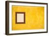 Grunge Yellow or Gold Stucco Wall with Empty Picture Frame-Virtuelle-Framed Art Print