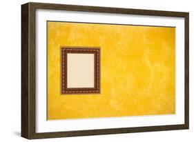 Grunge Yellow or Gold Stucco Wall with Empty Picture Frame-Virtuelle-Framed Art Print