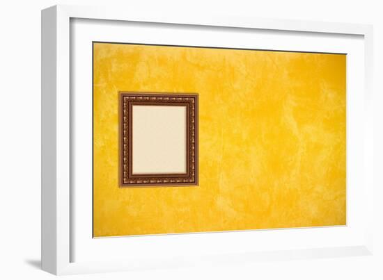 Grunge Yellow or Gold Stucco Wall with Empty Picture Frame-Virtuelle-Framed Art Print