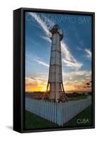 Guantanamo Bay, Cuba - Sunset and Lighthouse-Lantern Press-Framed Stretched Canvas