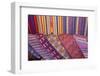 Guatemala, Antigua. Colorful weavings for sale in shop in Antigua.-Julie Eggers-Framed Photographic Print