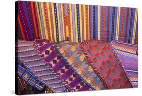 Guatemala, Antigua. Colorful weavings for sale in shop in Antigua.-Julie Eggers-Stretched Canvas