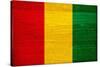 Guinea Flag Design with Wood Patterning - Flags of the World Series-Philippe Hugonnard-Stretched Canvas