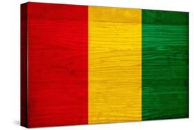 Guinea Flag Design with Wood Patterning - Flags of the World Series-Philippe Hugonnard-Stretched Canvas