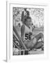 Gunhild Larking, Sweden's Entry for High Jump, Nervously Awaiting Turn to Compete at Olympic Games-George Silk-Framed Premium Photographic Print