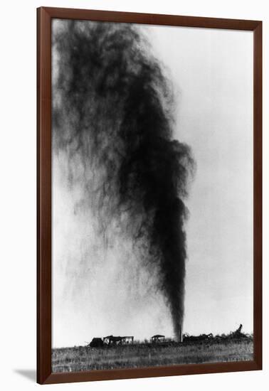 Gushing Oil Well after Gas Explosion Destroyed Derrick-null-Framed Premium Photographic Print